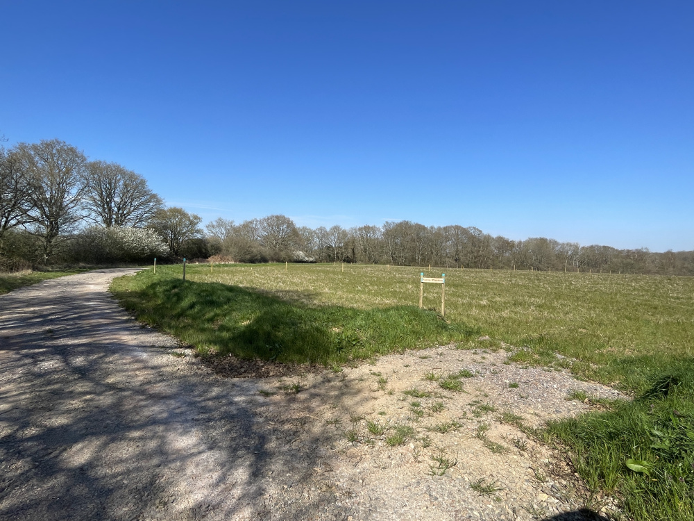 Access track leading to hardstanding at entrance to meadow